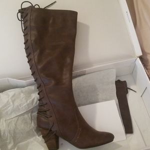 Brown laceup boots.